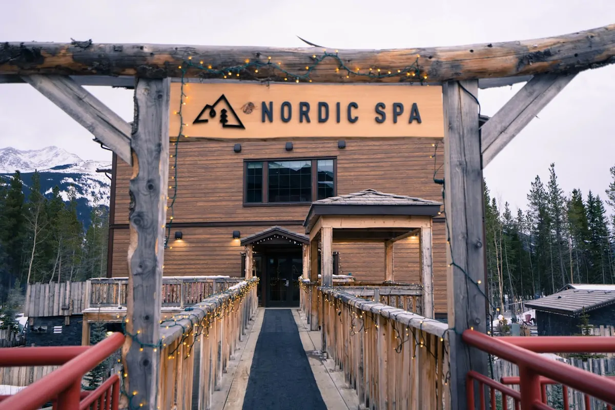 a wooden building with a sign on it